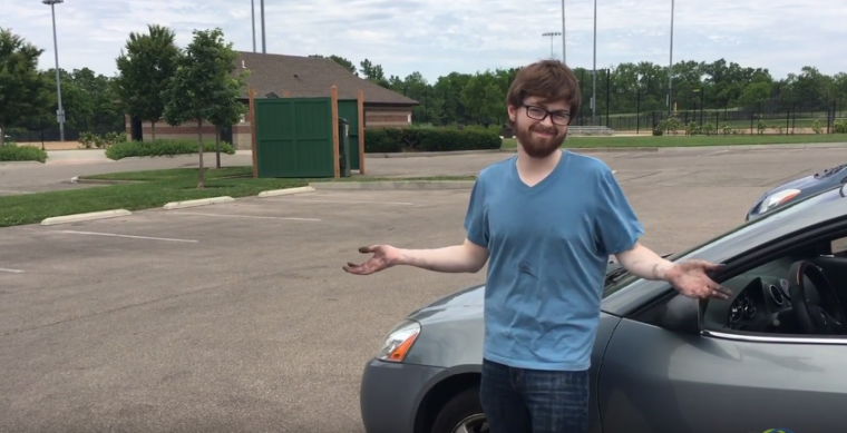 Daniel Susco with dirt all over his hands