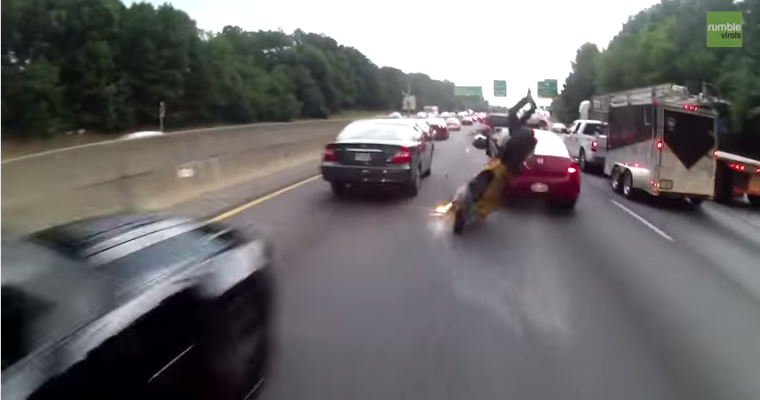 Careless Motorcyclist Crashes While Lane Splitting – Or DOES He? [VIDEO]