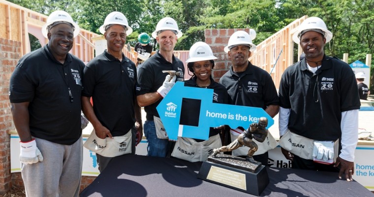 5 Heisman Winners Build Habitat Home