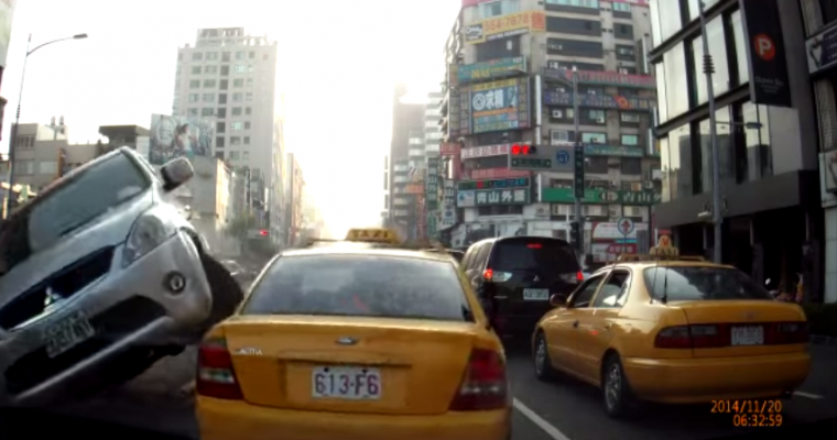 [Watch] Mitsubishi Crashes Into Cab, Sticks Landing, 8/10