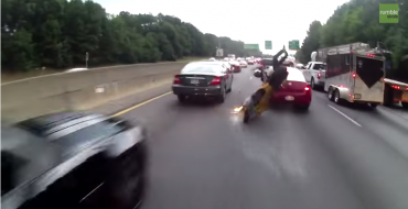 Careless Motorcyclist Crashes While Lane Splitting – Or DOES He? [VIDEO]