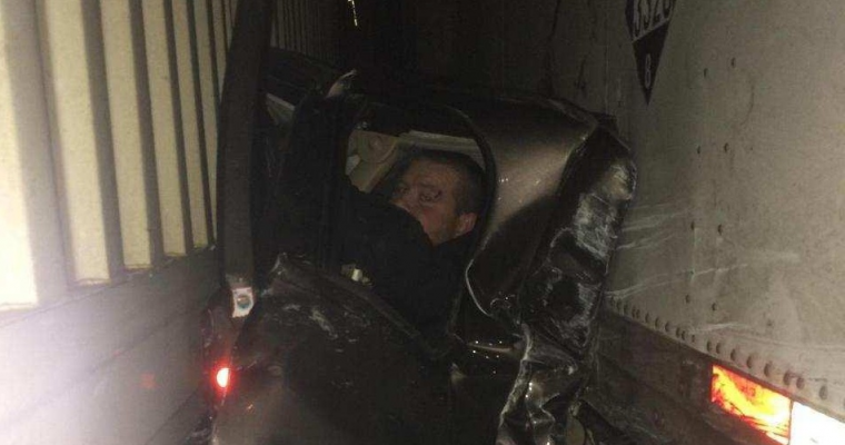 Chevy Silverado Driver Trapped Between Two Semis Walks Away Unharmed