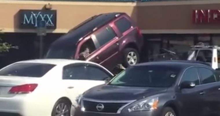 [VIDEO] Florida Man Unsuccessfully Attempts to Drive SUV Off of Tow Truck