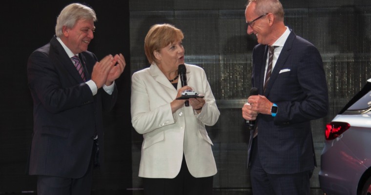 Opel Presents Angela Merkel with New Astra (Toy)