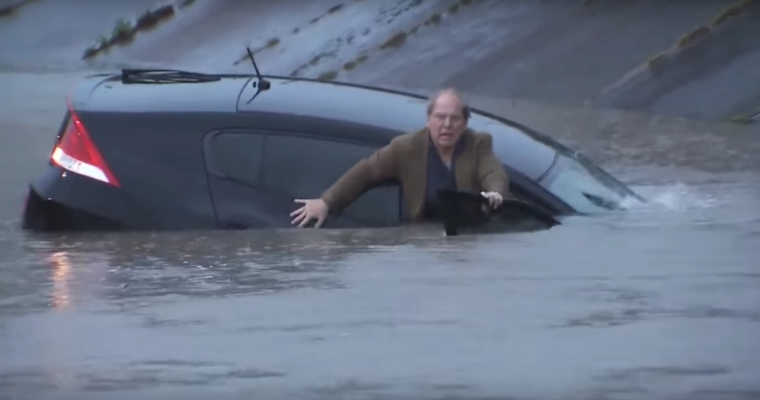 Man Drives Ironically Named Honda Insight Right Into a Flood
