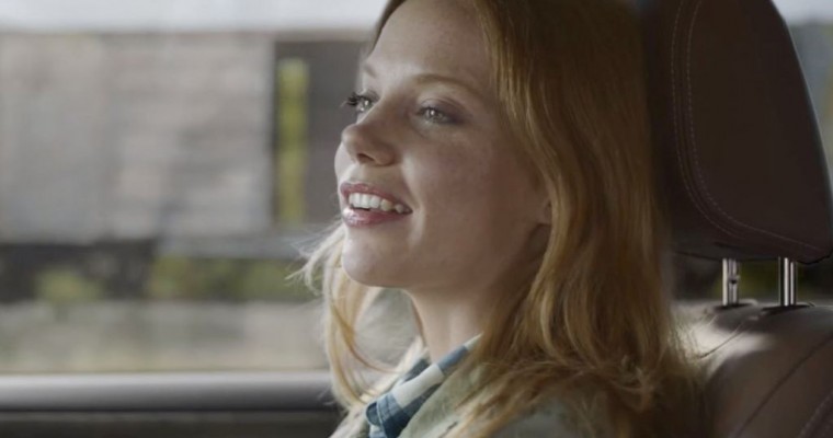 Who Is the Red-Haired Woman Riding the Train in Subaru’s “Boxcar” Commercial?