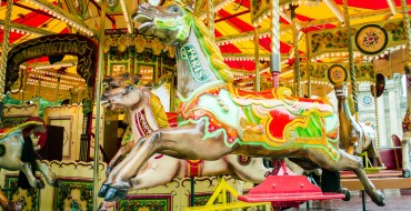 Driver Crashes BMW into Carousel Horse Sculpture