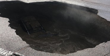 Colorado Woman Narrowly Escapes Her Vehicle Before It Collapses Into a Sinkhole