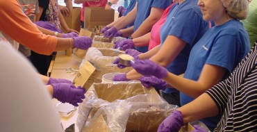 Volkswagen Group of America Employees Pack Over 35,000 Meals for Children