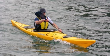 Kayaker and Paddleboarder Rescue Woman From Submerged Car