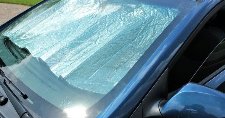Is It Better to Use a Cardboard or Reflective Windshield Sun Shade?