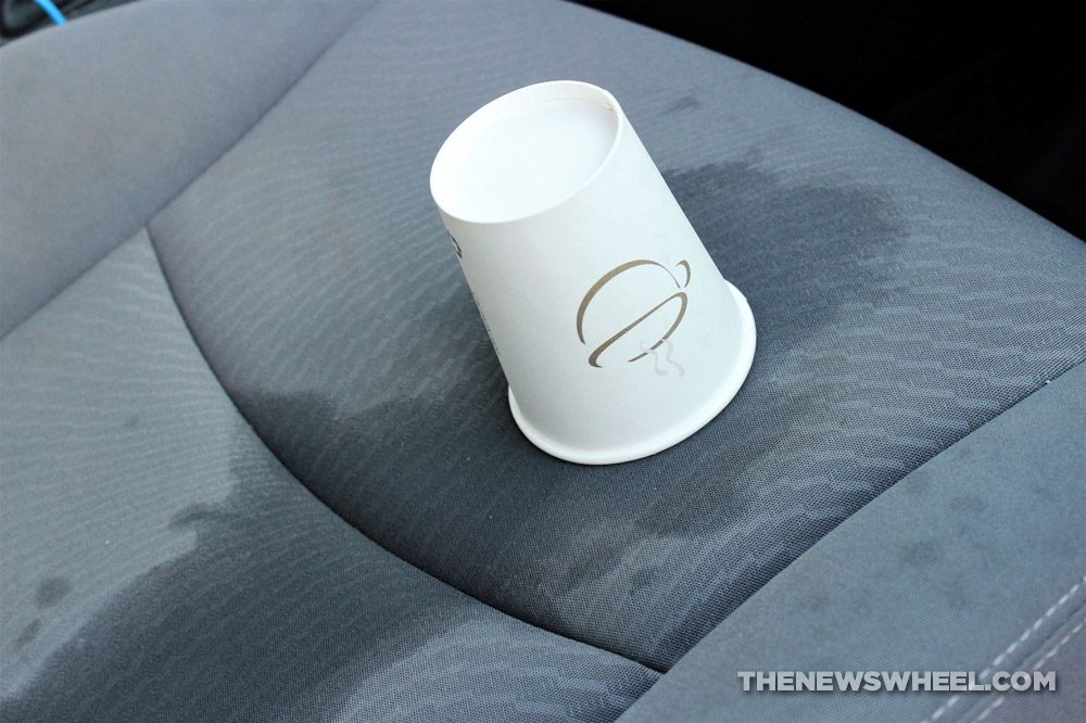 car seat spill stain coffee drink mess clean