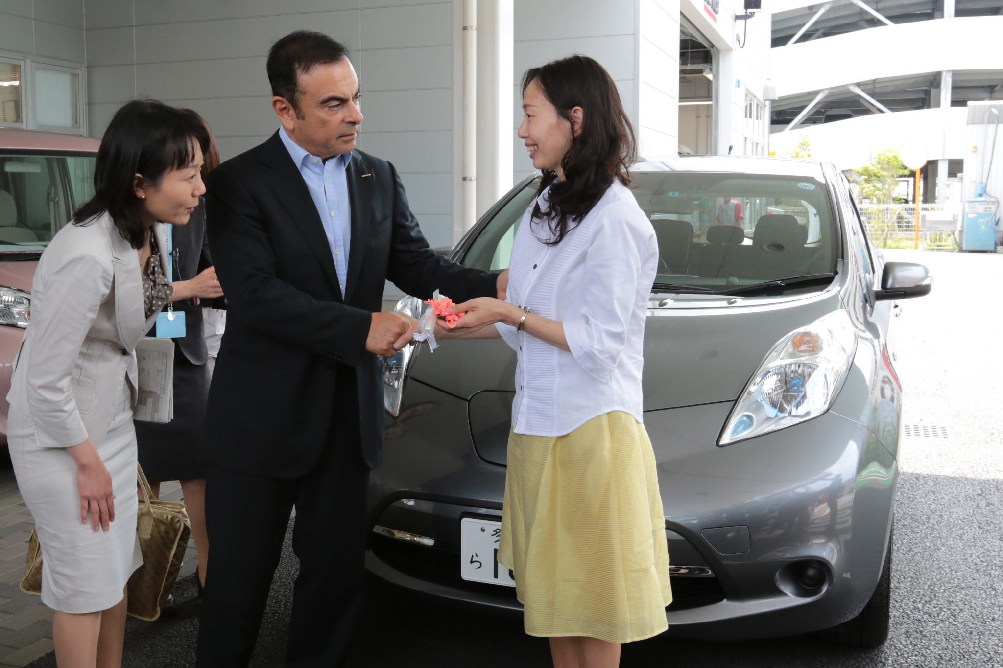 Female Car Buyers Woman Driving buying cars dealership