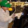 A worker assembles a Civic Natural Gas Vehicle at the Greensburg Honda Plant