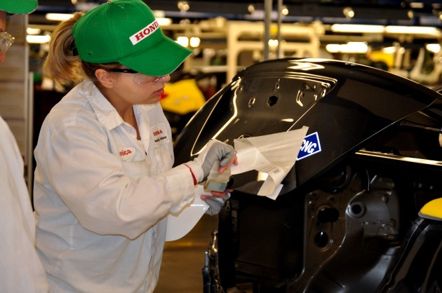 A worker assembles a Civic Natural Gas Vehicle at the Greensburg Honda Plant
