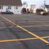 Dad Doing Donuts with His Son in an Old Camaro