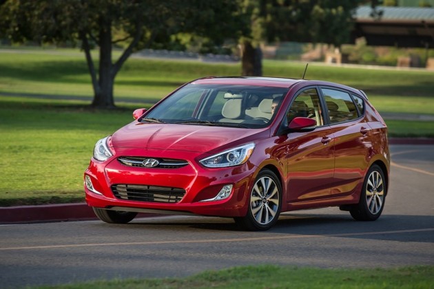 2015 Hyundai Accent Overview red exterior driving