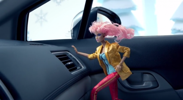 Jem feels AC in her hair inside a Honda Civic, joining other classic toys in the new nostalgic Honda car commercials