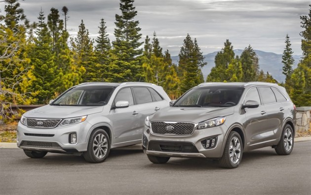 The all-new 2016 Kia Sorento (right) sits next to the outgoing 2015 model (left)