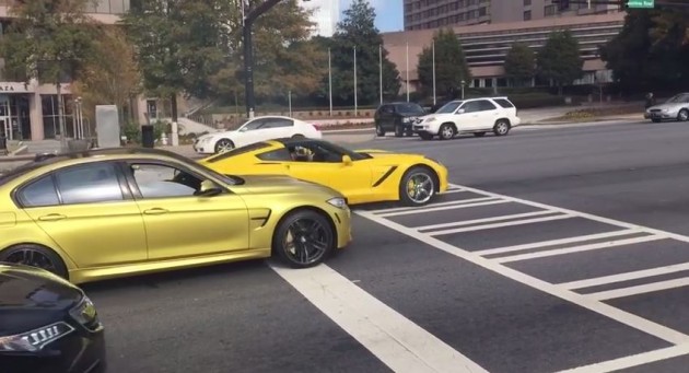 A BMW M3 and Corvette Stingray drag race in Atlanta, Georgia