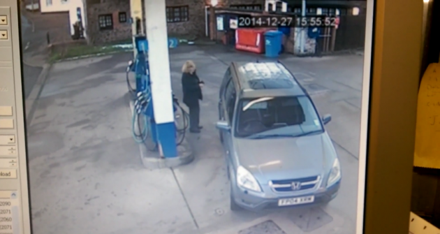 woman can't find gas cap