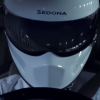 Here's how the driver in the Kia Sedona commercial originally looked