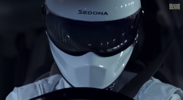 Here's how the driver in the Kia Sedona commercial originally looked