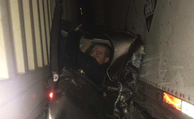 Chevy Silverado Driver Trapped Between Two Semis Walks 