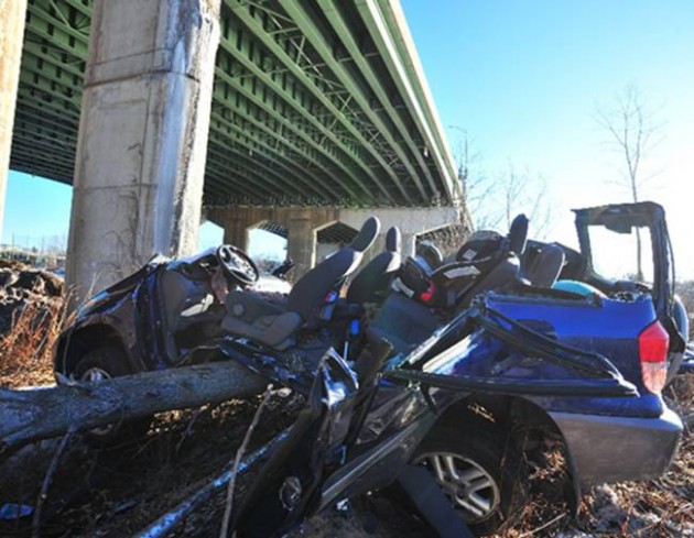 Toyota RAV4 drives off bridge