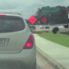 A South Carolina motorist gives a Chic-fill-A mascot a fist bump in a bad driving video compilation