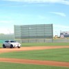 Jose Ramirez's car parked at the shortstop position at Goodyear Stadium