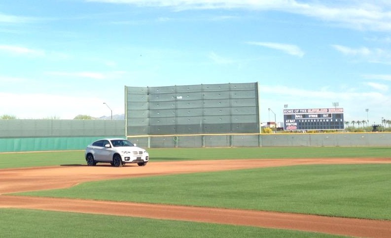 Jose Ramirez's car parked at the shortstop position at Goodyear Stadium