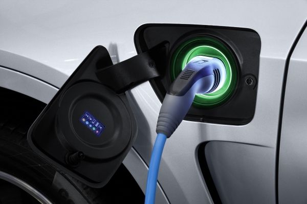 Silver plug-in BMW X5 xDrive40e SUV charging outlet