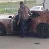 camouflaged Camaro sports car