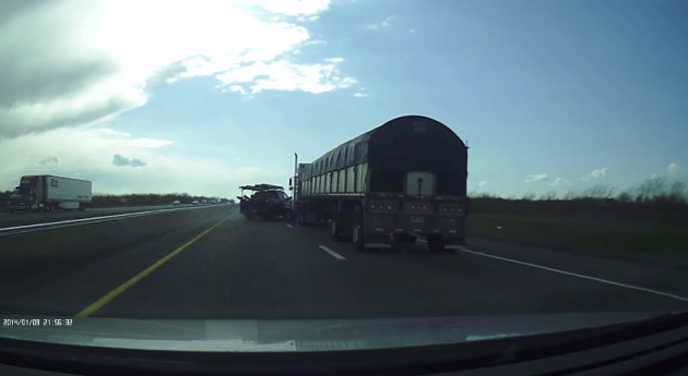 Black fifth-gen Camaro causes wreck