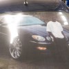 Buick LaCrosse with photo of driver on the back window