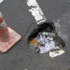 NYC Pothole or Garbage Can?