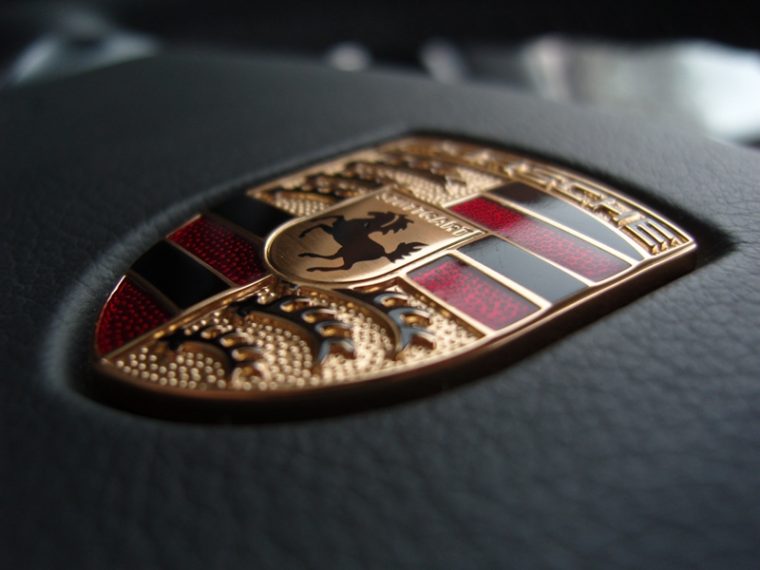 Historic Porsche Crest's Inspiration logo badge emblem meaning