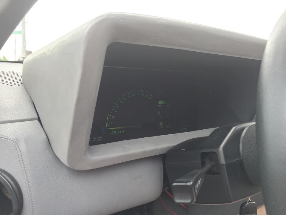 A DeLorean DMC-12 with a custom digital display screen