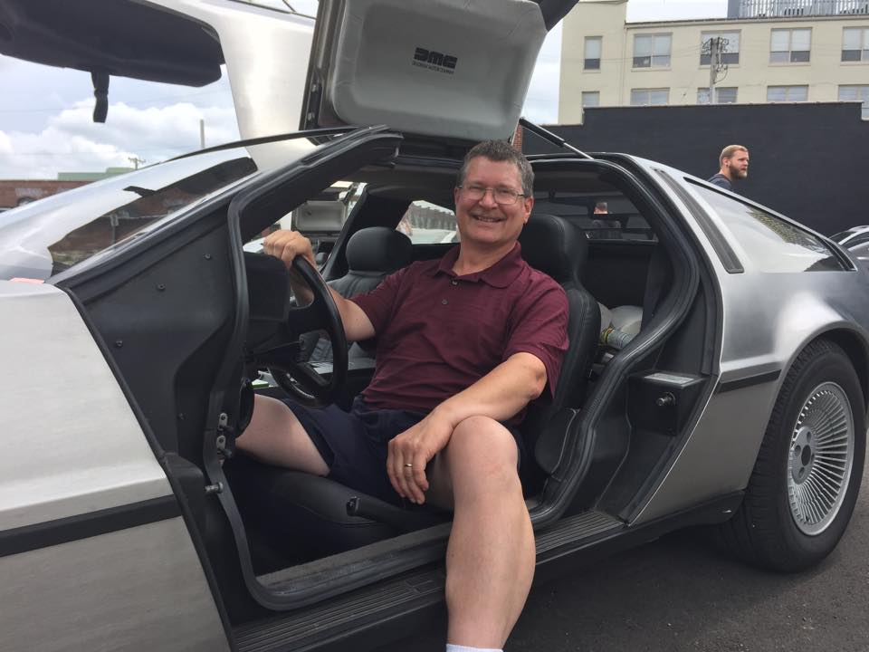 Doug Menkaus in his restored DeLorean DMC-12