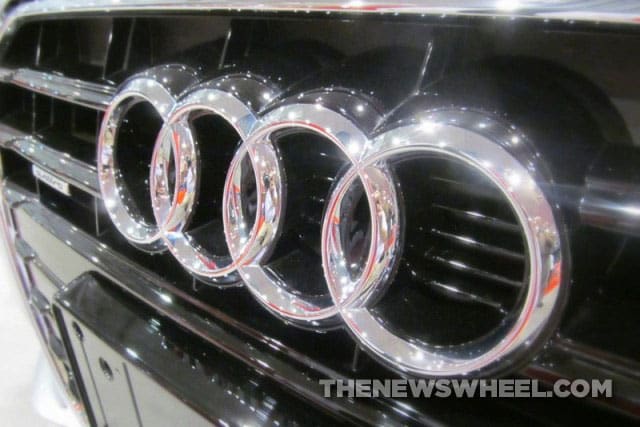 The Interesting Story Behind The Four Circled Symbol Of Audi Logo -  Creative Polo