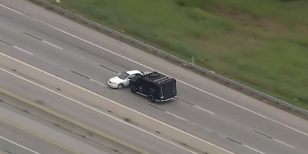 Gonzales being hit by a SWAT armored car