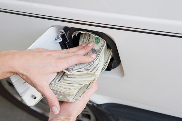 Money cash into gas tank Premium gasoline benefits