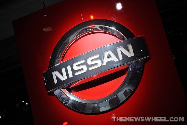 Nissan Logo emblem name badge origin history