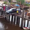 car boarding a ship over a plank