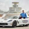 Chevrolet VP Mark Reuss poses with the Chevrolet Dual in Detroit pace car