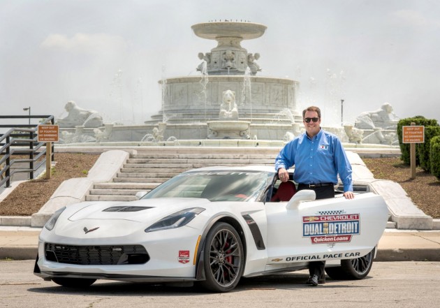 Chevrolet VP Mark Reuss poses with the Chevrolet Dual in Detroit pace car 