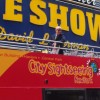 Paul Shaffer atop his dedicated Gray Line bus in front of the Ed Sullivan Theater