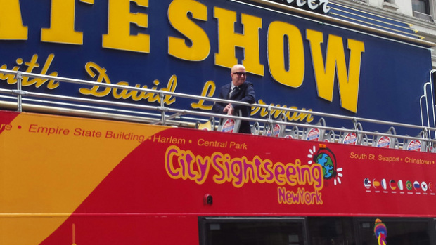 Paul Shaffer atop his dedicated Gray Line bus in front of the Ed Sullivan Theater 