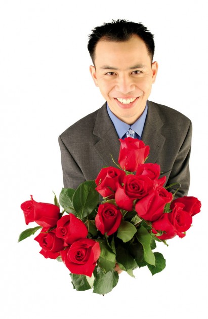 man holding flowers